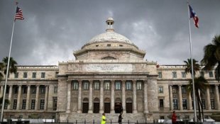 Banco de Porto Rico suspende pagamento da dívida limitando o default